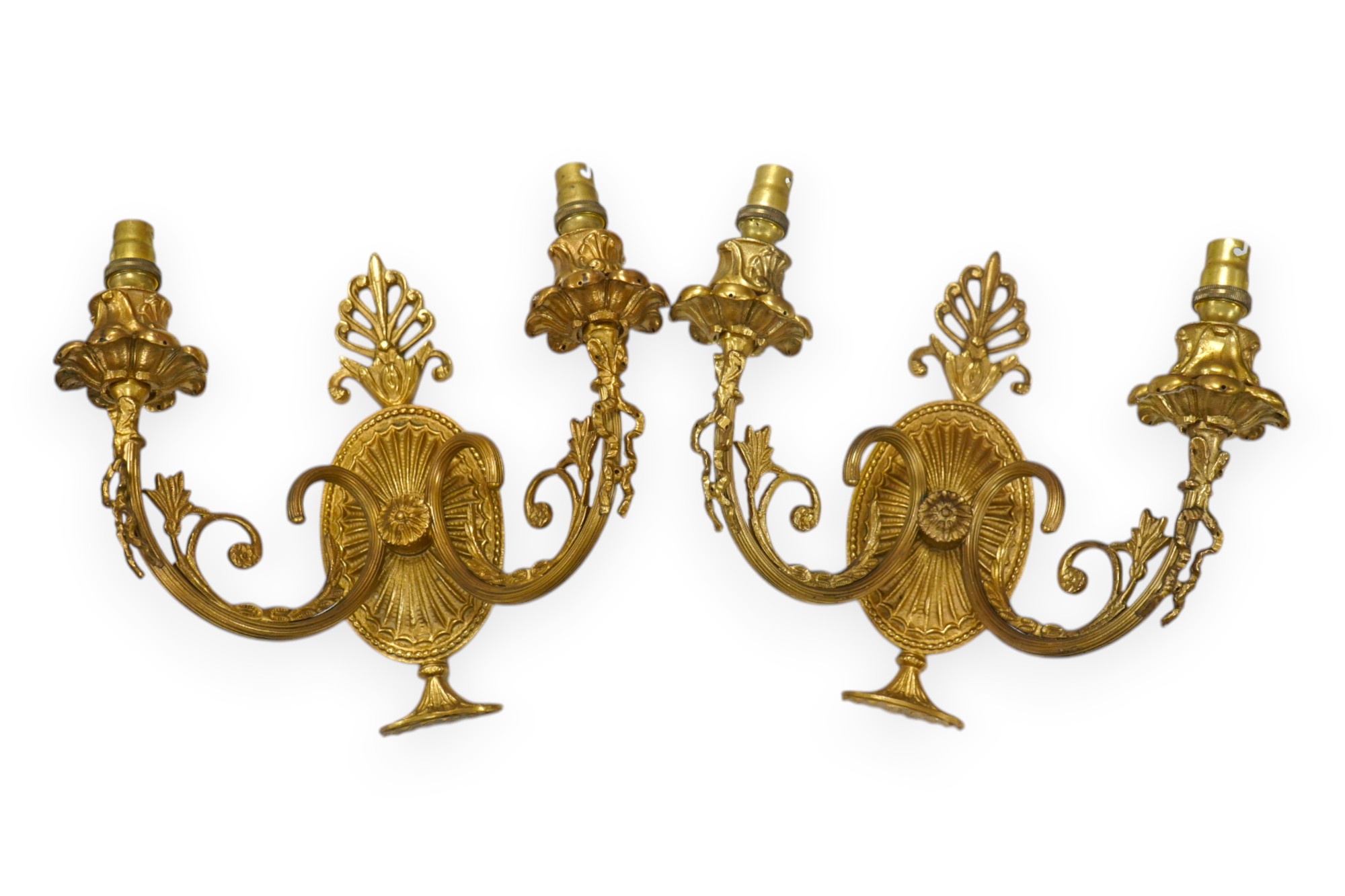 A pair of Adam style gilt brass twin branch wall lights, 23cm long. Condition - good